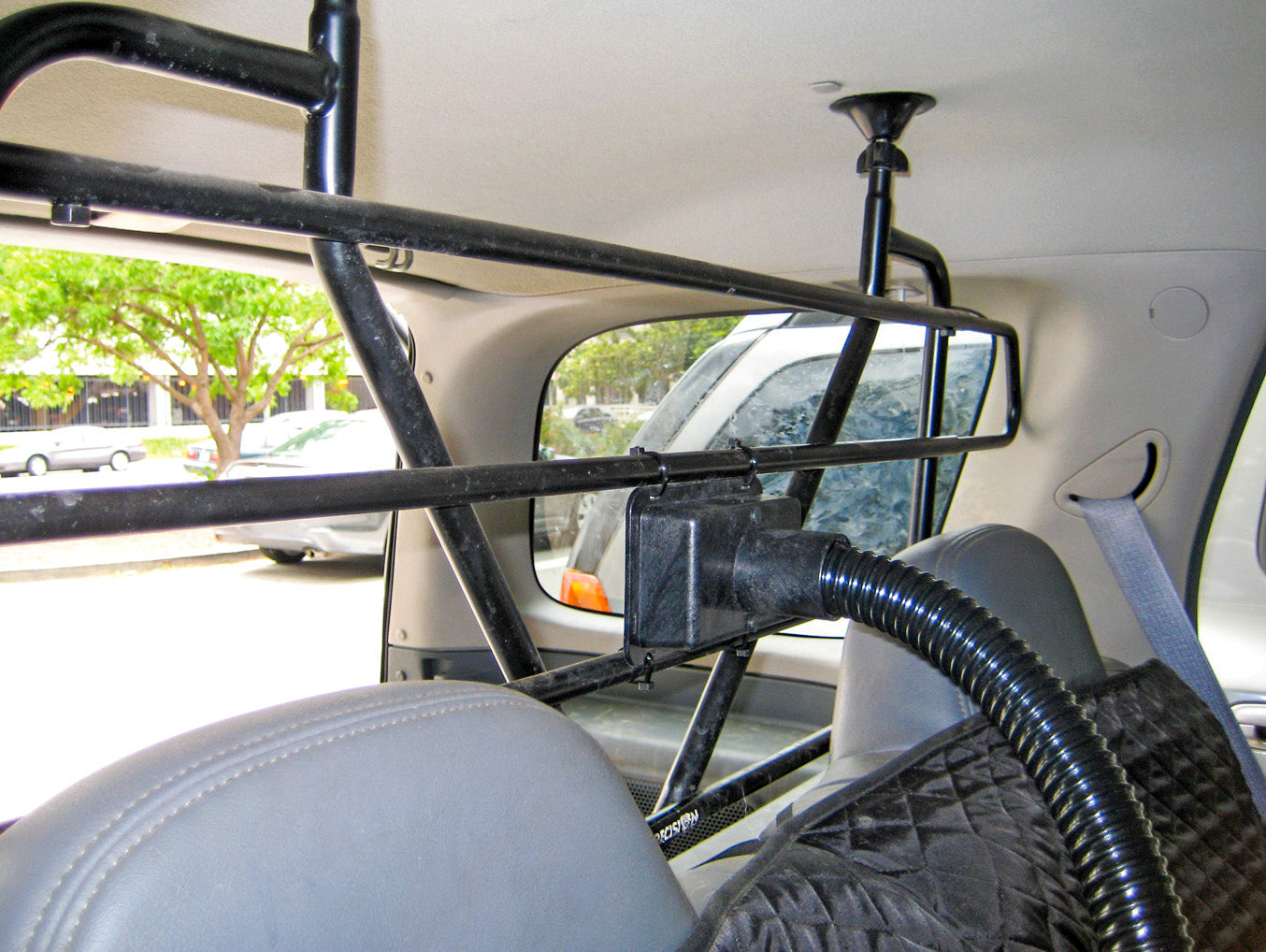 CoolK9 set up in SUV to channel cool air behind barrier